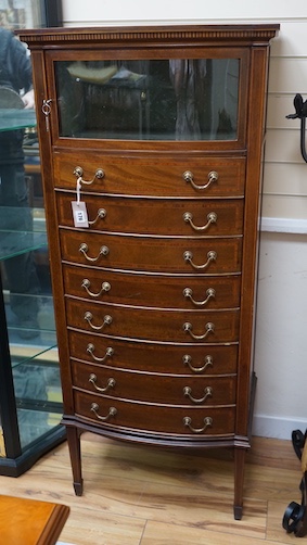 An Edwardian satinwood banded mahogany bowfront sheet music cabinet, width 61cm, depth 44cm, height 143cm